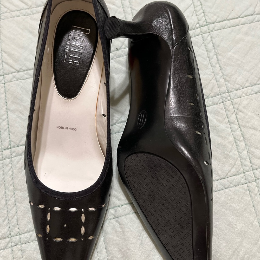 Nickels Black Heels with Pointed Toe and Decorative Buckle